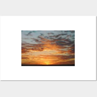 beautiful patterned golden glow with elegant cloudscape at sunset Posters and Art